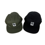 Two black and green caps with a logo.